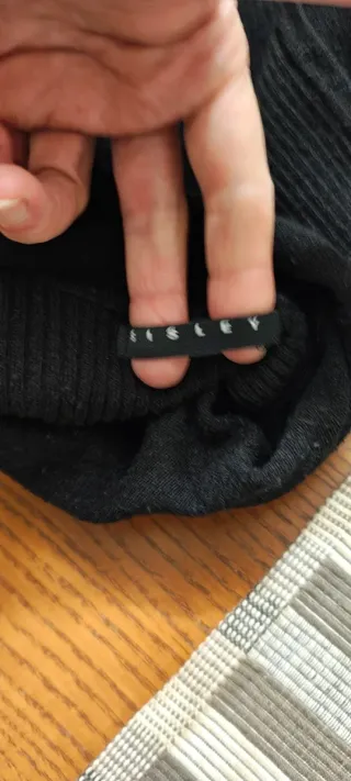 Sottogiacca Sisley nero collo alto