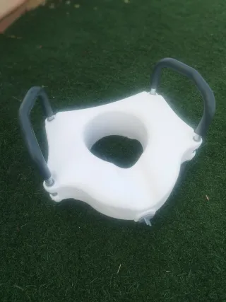 Elevador WC con Reposabrazos, sólo con 2 usos.