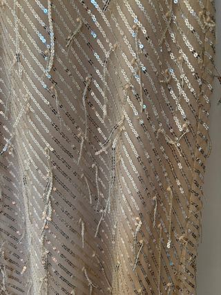 Falda larga de lentejuelas beige y dorada