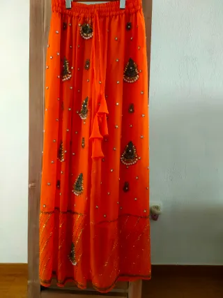 Falda naranja gasa hindú pedrería talla única.