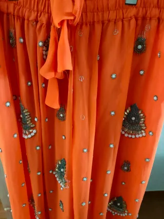 Falda naranja gasa hindú pedrería talla única.