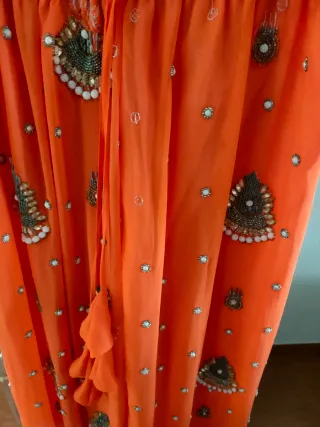 Falda naranja gasa hindú pedrería talla única.