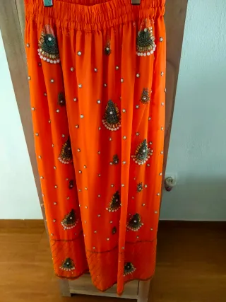 Falda naranja gasa hindú pedrería talla única.