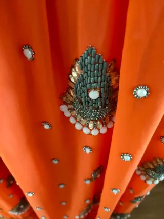 Falda naranja gasa hindú pedrería talla única.
