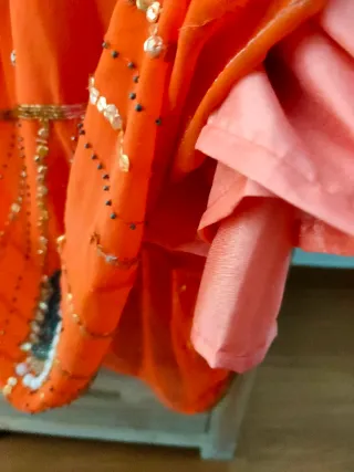 Falda naranja gasa hindú pedrería talla única.