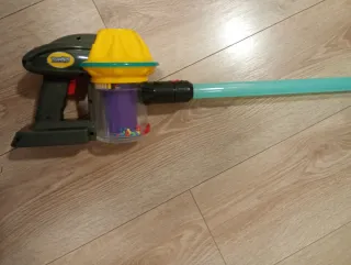 Aspirador de juguete con tubo