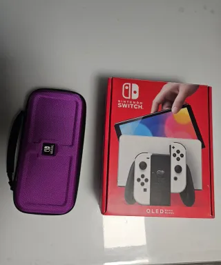 Nintendo Switch OLED + Funda Morada y dos mandos