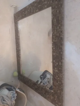 Espejo de entrada con marco de piedra