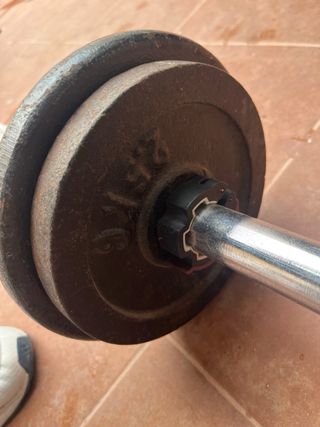 Barra de pesas con discos