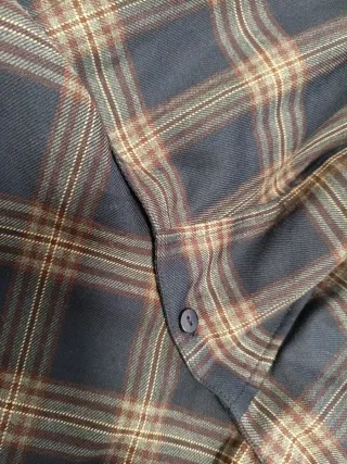 Chaqueta de cuadros azul y marrón granate