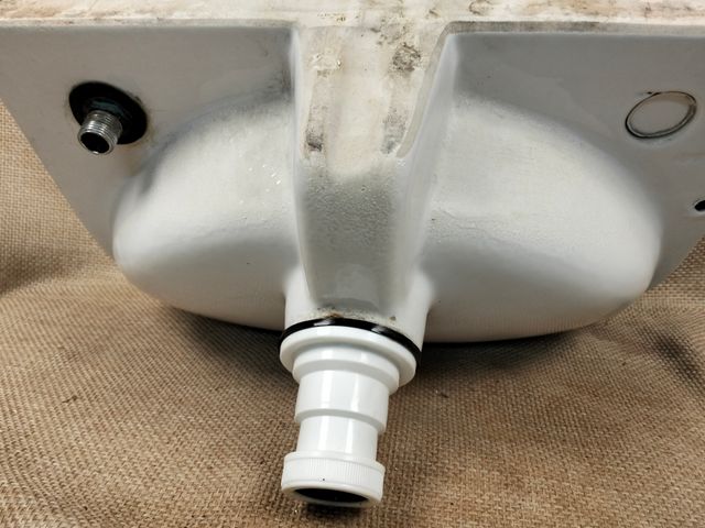 Lavabo pequeño de porcelana blanco