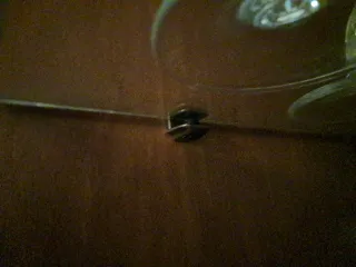 Armario de salón de madera y cristal