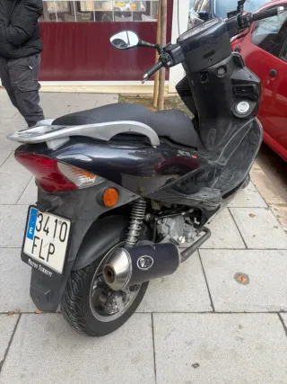 Kymco Bet & Win 125cc o cambio S25 ultra iPhone 17