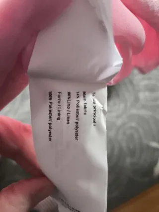 Blusa rosa sin mangas, a estrenar