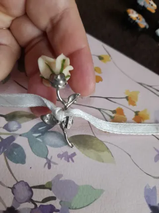 Rosa in argento e ceramica