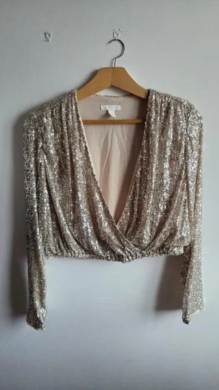 Blusa de lentejuelas champán