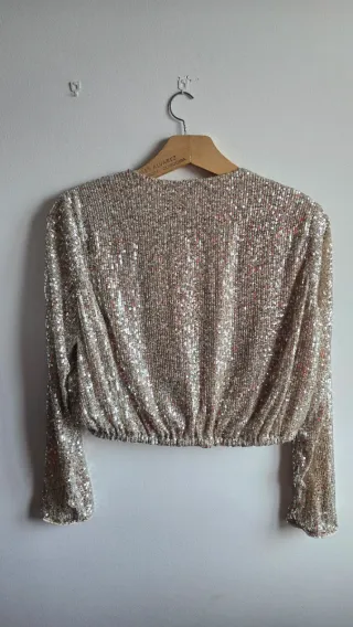 Blusa de lentejuelas champán