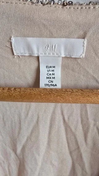 Blusa de lentejuelas champán