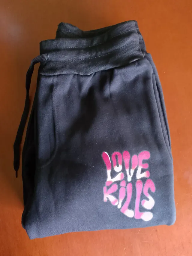 Pantalón chándal mujer negro con rosa