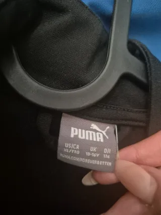 Conjunto deportivo Puma negro y azul