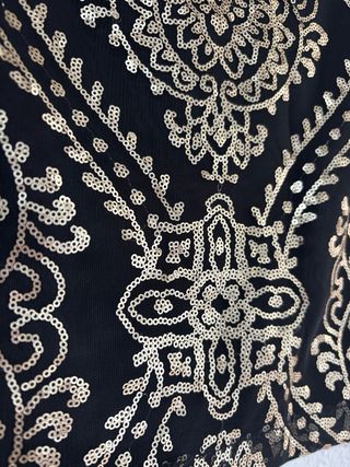 Falda Stradivarius lentejuelas doradas