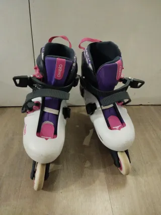 Patines en línea blancos y morados