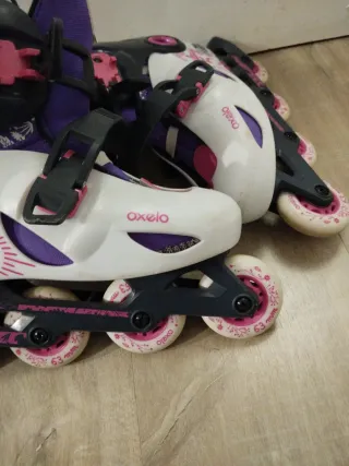 Patines en línea blancos y morados