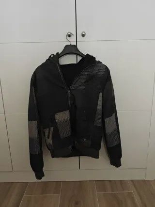 Cazadora Rip Curl Negra y Gris