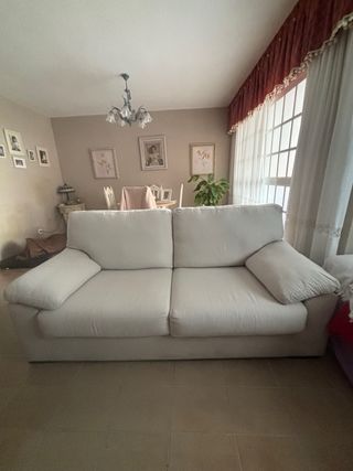 Sofá de tela beige como nuevo