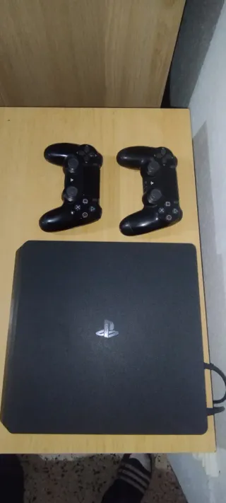 Consola PlayStation 4 Slim,+2 mandos y +10 juegos.