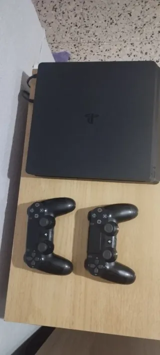 Consola PlayStation 4 Slim,+2 mandos y +10 juegos.