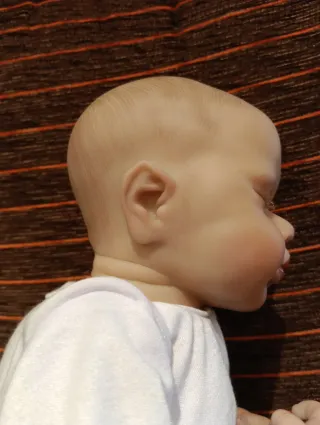 Muñeca Reborn con chupete y biberón