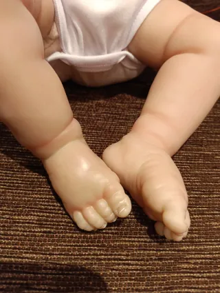 Muñeca Reborn con chupete y biberón