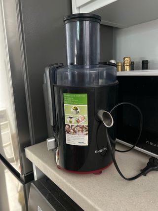 Exprimidor de zumos negro