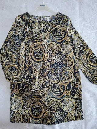 Mini abito manica lunga nero e oro