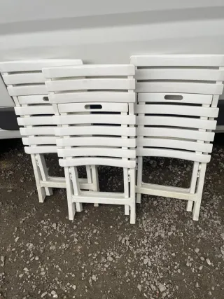 Sillas plegables de plástico blancas