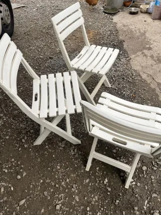 Sillas plegables de plástico blancas