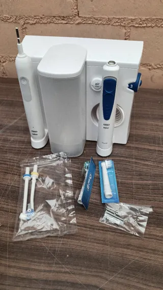 Oral Health Center - Irrigador + cepillo de diente