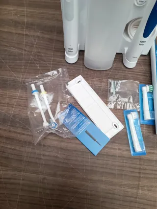 Oral Health Center - Irrigador + cepillo de diente