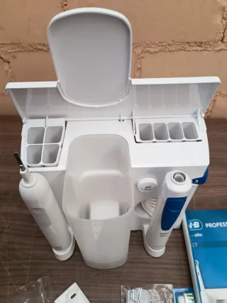 Oral Health Center - Irrigador + cepillo de diente