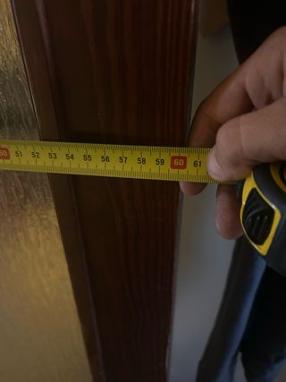 Puerta doble de madera con cristal