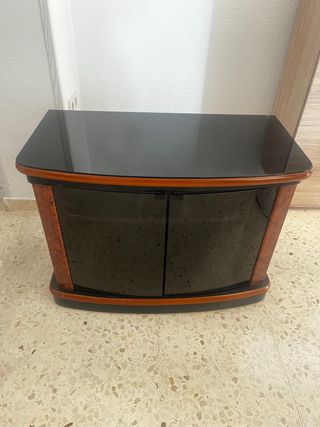 Mesa TV cristal giratoria 360 grados con armario.