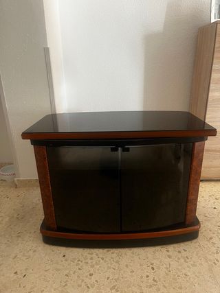 Mesa TV cristal giratoria 360 grados con armario.