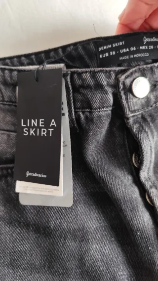 Falda tejana negra con detalles plateados