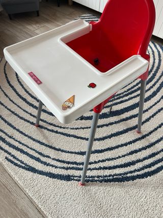 Trona infantil con reductor y funda a rayas