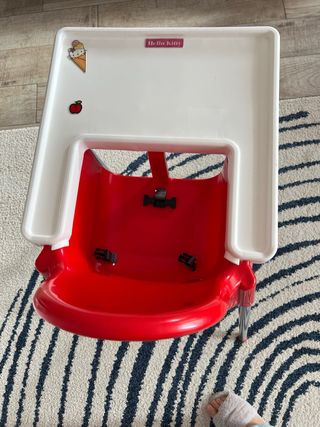 Trona infantil con reductor y funda a rayas