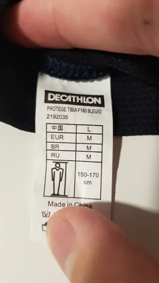 Pantorrilleras Kipsta Azul y Negro