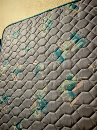 Colchón fino para cama de arrastre.