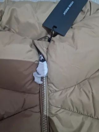 Chaleco largo acolchado beige mujer