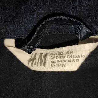 Jaqueta Softshell amb caputxa talla 152